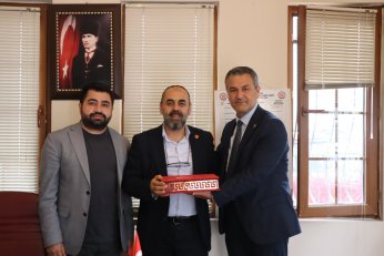 Muhtarlara doğum günü ziyareti