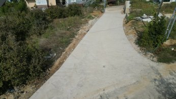 Beton yol çalışmalarını sürdürüyor
