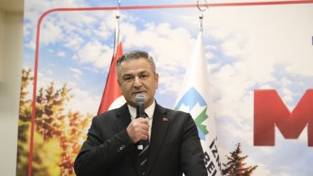 Muhtarların gününü kutladı