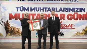 Muhtarların gününü kutladı