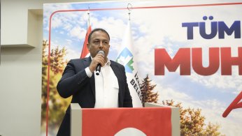 Muhtarların gününü kutladı