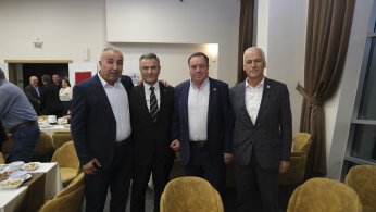 Muhtarların gününü kutladı