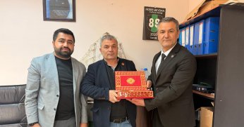 Muhtarlara doğum günü ziyareti